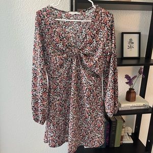 Floral, long sleeve mini dress with front cut outs